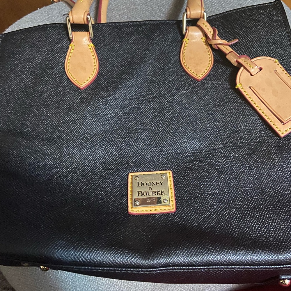 Donned& Burke Good Condition just a little spot inside the bag on the bottom.